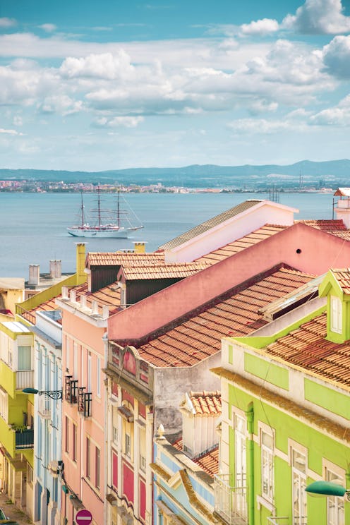 Idyllic view of the Alfama district in Lisbon with colorful classic houses with ceramics in beautifu...