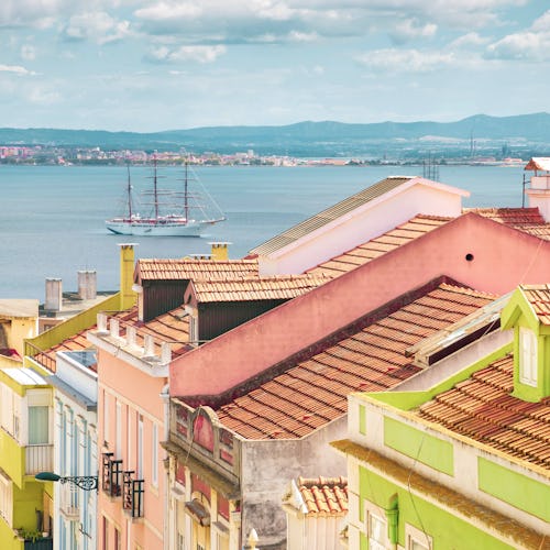 Idyllic view of the Alfama district in Lisbon with colorful classic houses with ceramics in beautifu...
