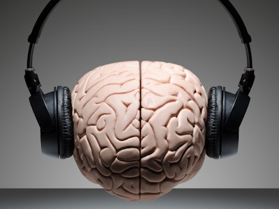 Brain model with headphones.