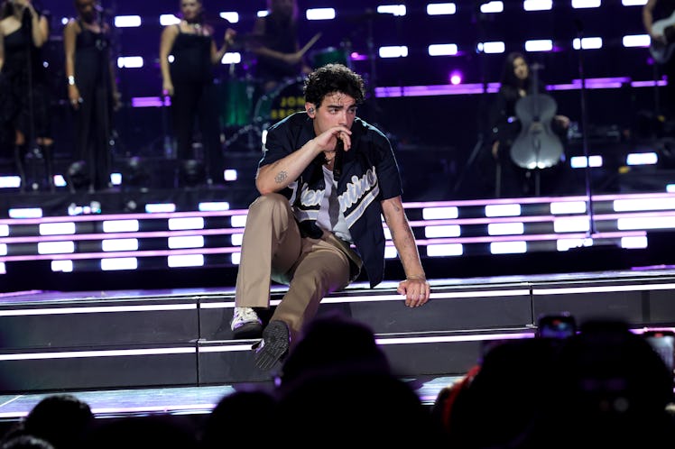 Joe Jonas performs onstage during Jonas Brothers' Tour at Yankee Stadium for VIP packages, while som...