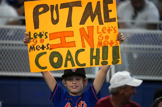 MIAMI, FL - JULY 31: A New York Mets fan holds up a sign during the game against the Miami Marlins a...
