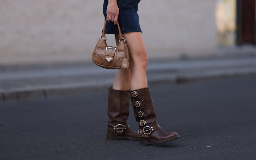 BERLIN, GERMANY - JUNE 02: Lea Naumann wearing Miu Miu brown leather boots, vintage brown leather be...