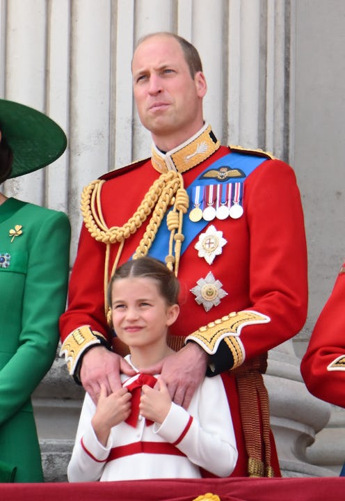 LONDON, ENGLAND - JUNE 17: Princess Charlotte of Wales and Prince William, Prince of Wales stand on ...