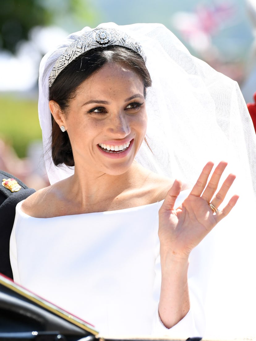 WINDSOR, ENGLAND - MAY 19: Meghan, Duchess of Sussex leaves Windsor Castle in the Ascot Landau carr...