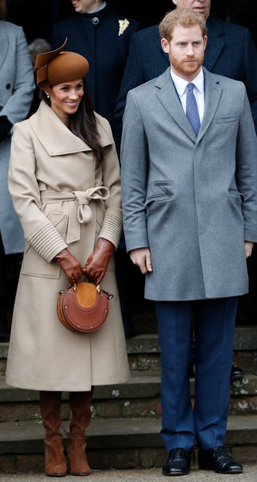 US actress and fiancee of Britain's Prince Harry Meghan Markle (L) and Britain's Prince Harry