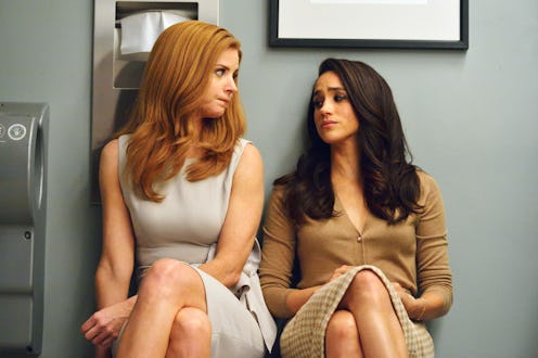 Sarah Rafferty and Meghan Markle on 'Suits.' Photo via Getty Images