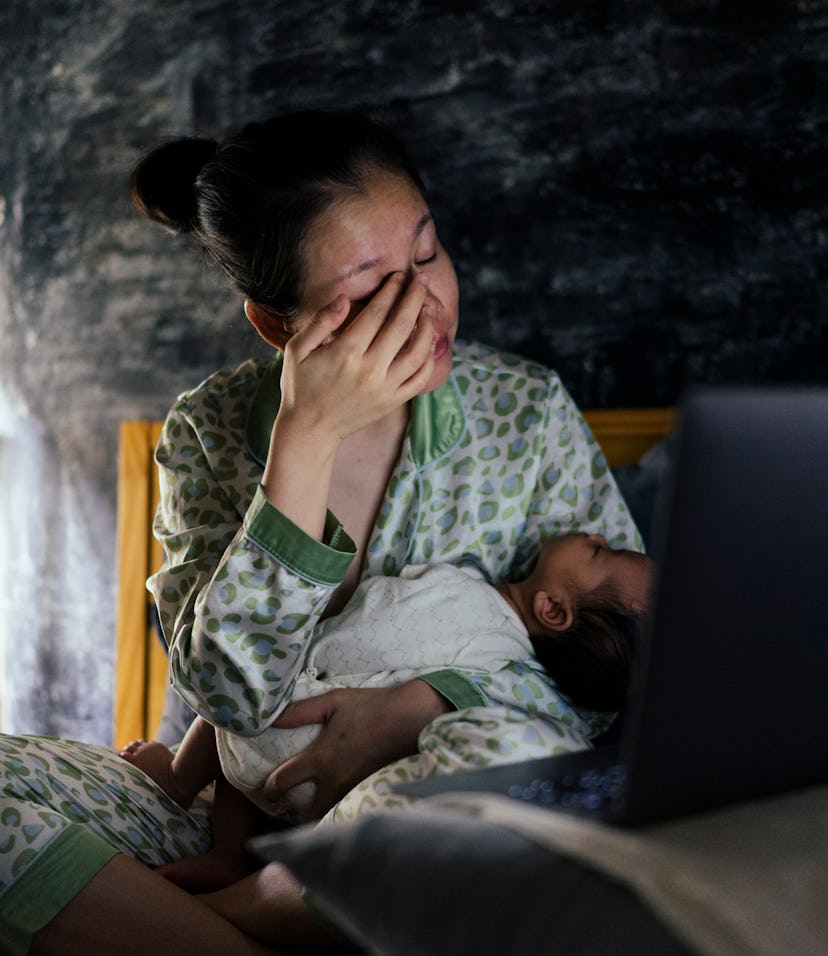 a mom breastfeeding in the night, in an article about when you can stop breastfeeding at night