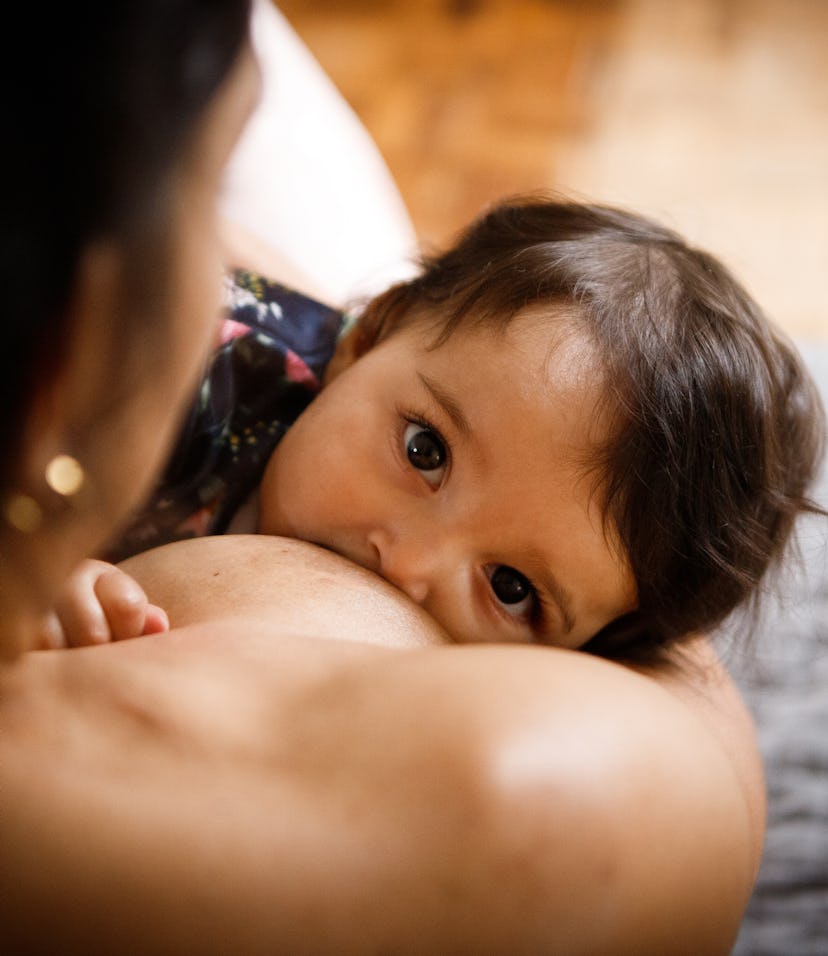 mother breastfeeding her baby