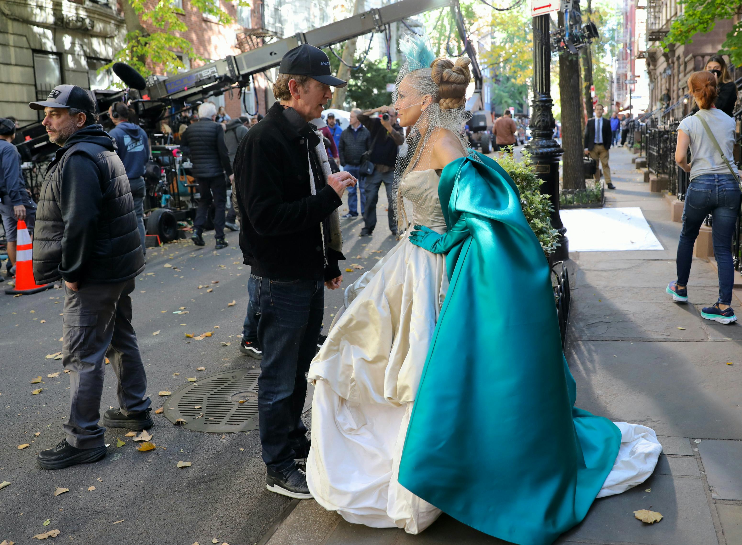 NEW YORK, NY - NOVEMBER 03: Michael Patrick King and Sarah Jessica Parker are seen on the set of &ldquo;An&hellip;
