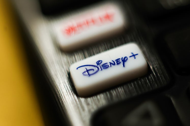 Disney + logo is seen on a TV remote control in this illustration photo taken in Krakow, Poland on A...
