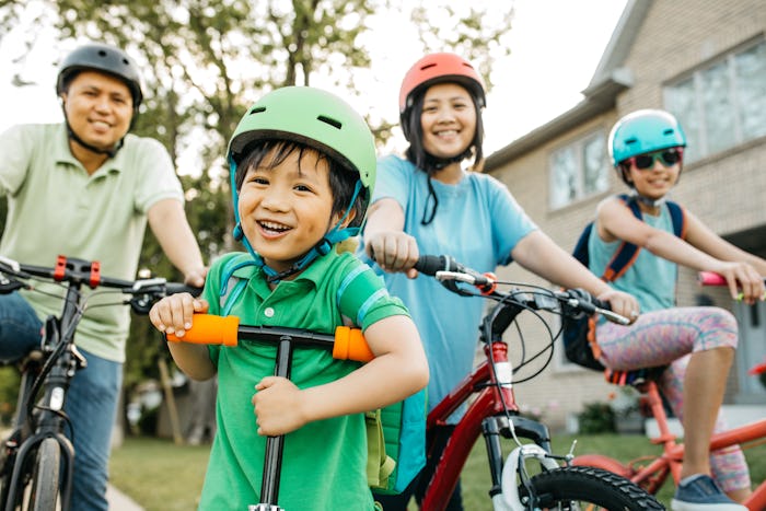 Family with bikes; takin ga bike tour with family is a cute labor day activity