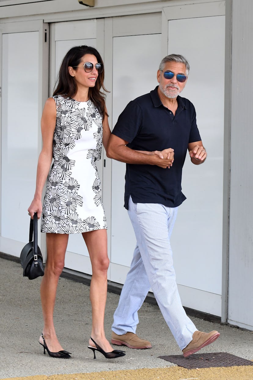 Amal Clooney and George Clooney are seen arriving at the Venice Airport on August 29, 2023 in Venice...
