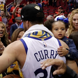 Stephen Curry rushes over to his wife Ayesha and mother Sonya Curry after the Golden State Warriors ...