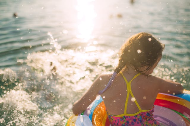 Child enjoying beach vacations