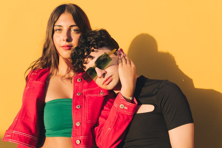 A young couple embracing as Mercury retrograde summer 2023 ends on Sept. 15.