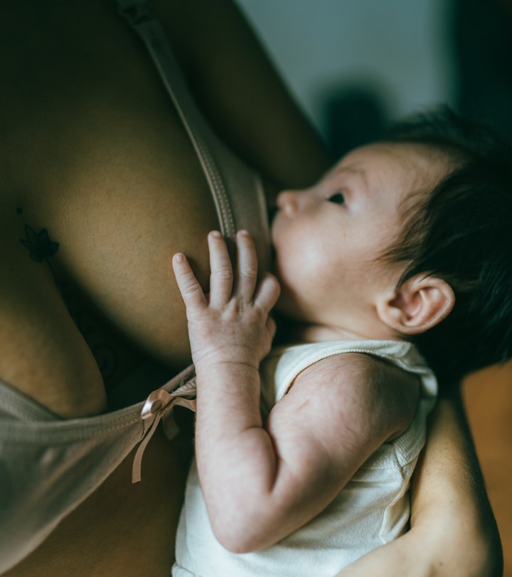 Close-up of baby being breastfed, in a round up of lactation consultants most common breastfeeding q...
