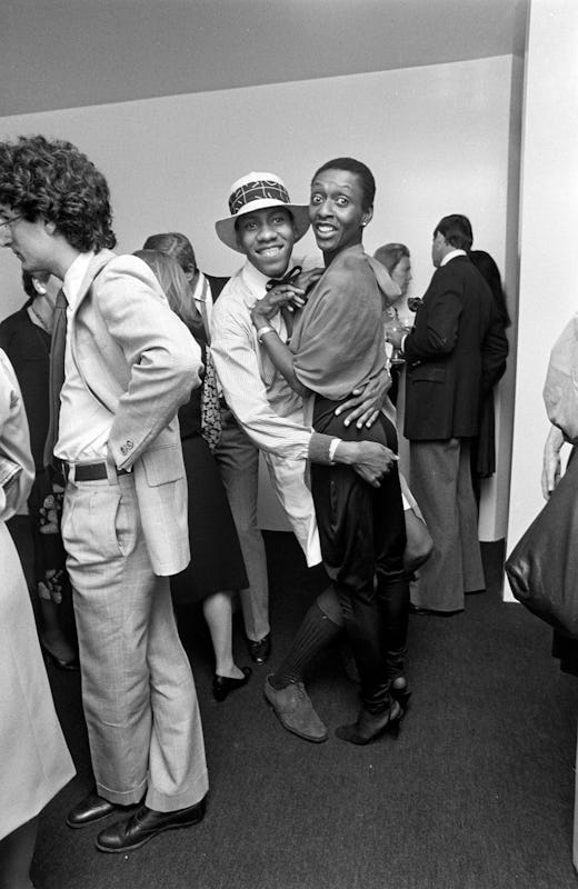 Andre Leon Talley and supermodel Bethann Hardison attend a Calvin Klein party.