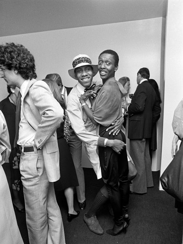 Andre Leon Talley and supermodel Bethann Hardison attend a Calvin Klein party.