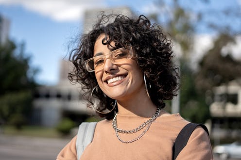 Latin woman portrait in the city