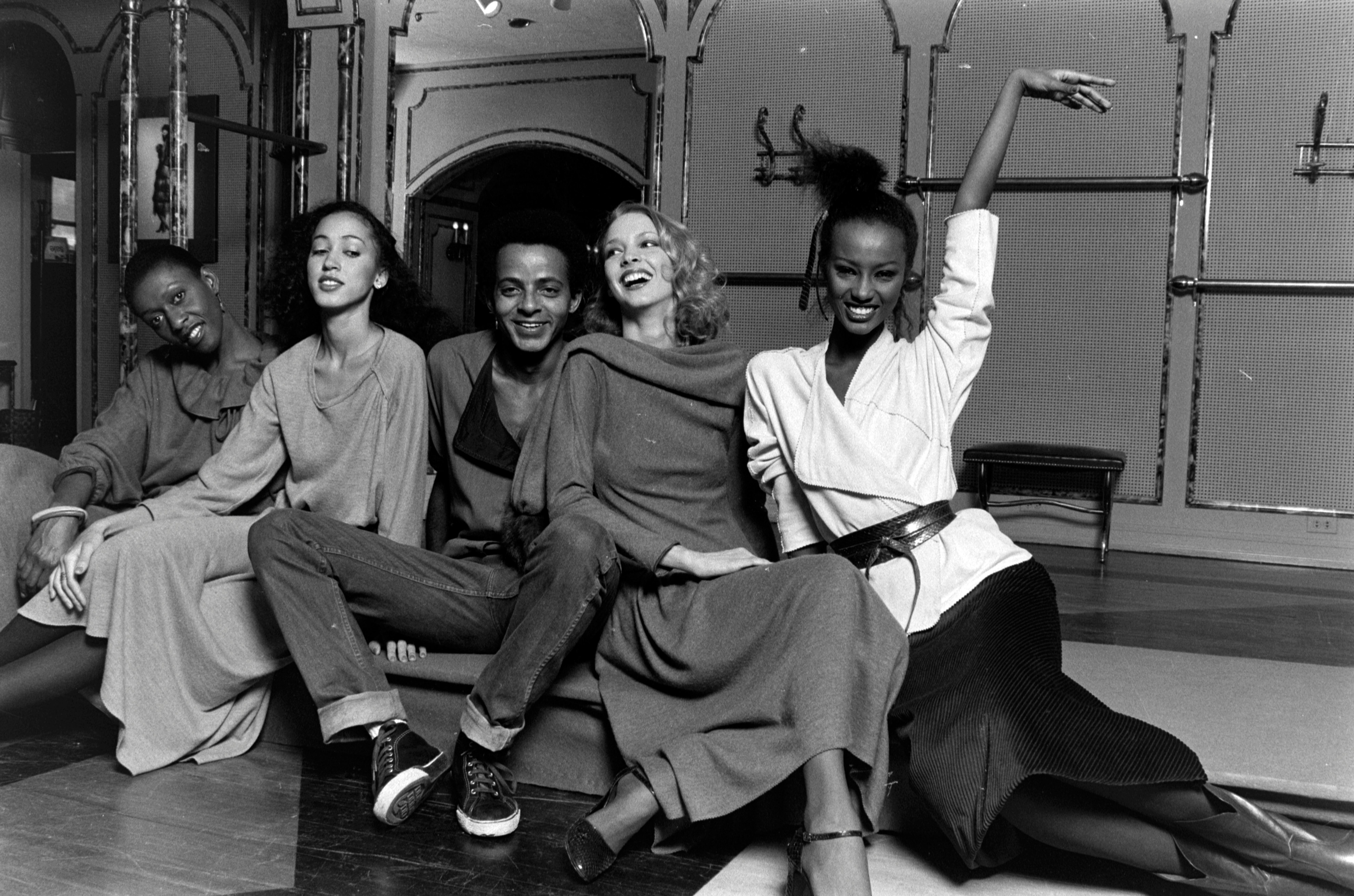 Models Bethann Hardison, Karen Bjornson, Alva Chinn and Iman pose with designer Stephen Burrows.