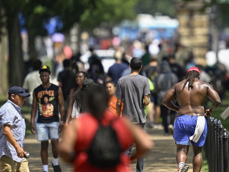 WASHINGTON DC, UNITED STATES - JULY 28: People spend time outside after Washington, DC and surroundi...