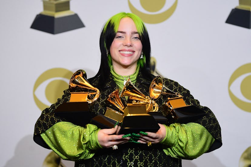 Billie Eilish neon green hair roots at Grammys 2020