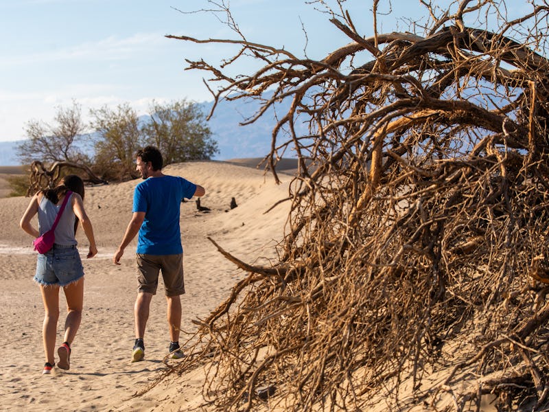 Death Valley, CA - July 16: Andrea Lazaro, left, and Jose Luis Nicolas, quickly walk from their car ...