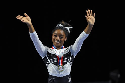HOFFMAN ESTATES, ILLINOIS - AUGUST 05: Simone Biles celebrates after winning the all-around at the C...