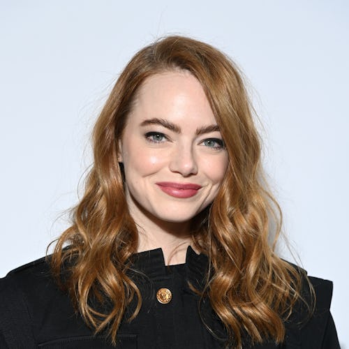 Emma Stone curly red hair at fashion show 2022