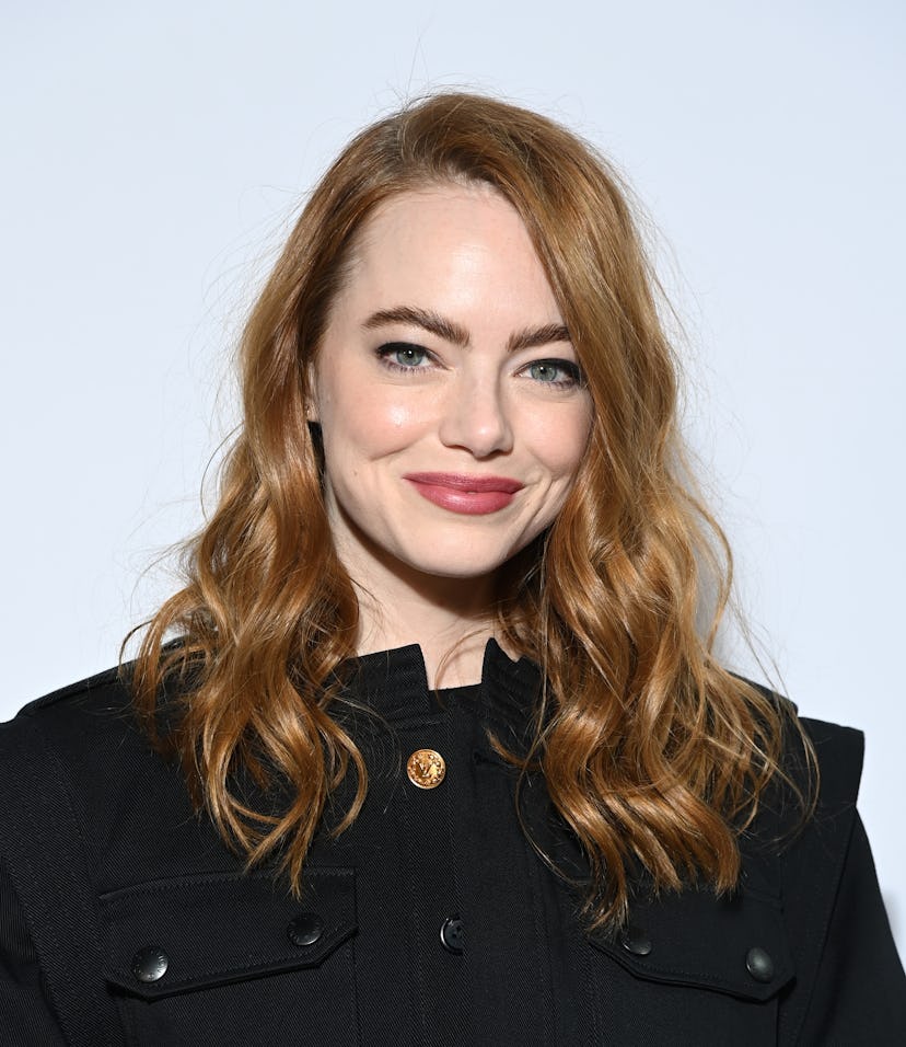 Emma Stone curly red hair at fashion show 2022