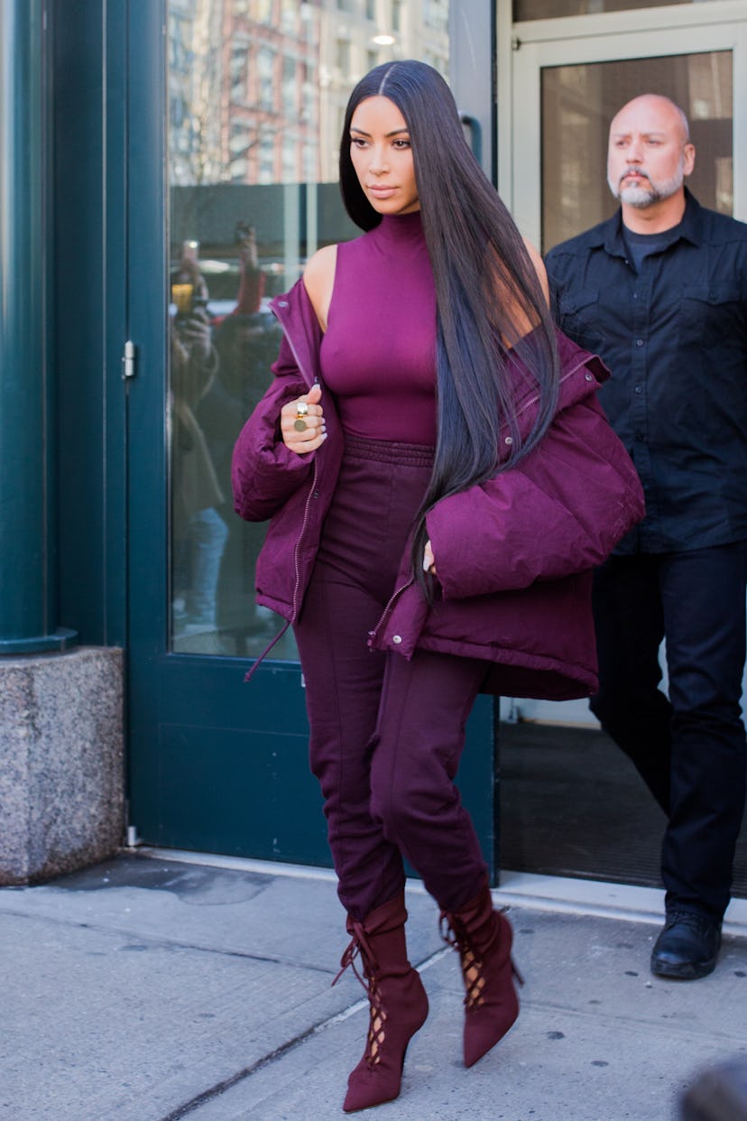 Kim Kardashian wears a head-to-toe purple outfit in 2017.