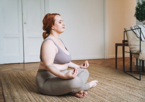 The best yoga poses for your crown chakra, according to the pros.