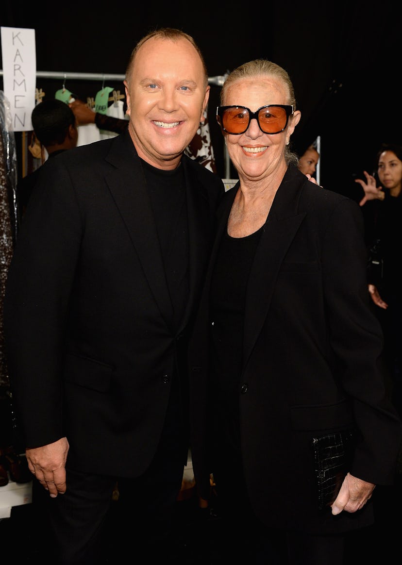 NEW YORK, NY - SEPTEMBER 11: Designer Michael Kors and Joan Kors backstage at the Michael Kors fash...