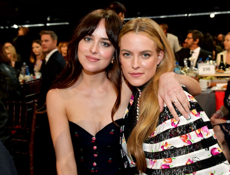 Dakota Johnson and Riley Keough pose during the 2019 Film Independent Spirit Awards on February 23, ...
