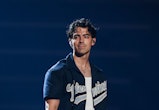 DETROIT, MICHIGAN - AUGUST 24: Joe Jonas performs onstage during Jonas Brothers “Five Albums, One Ni...