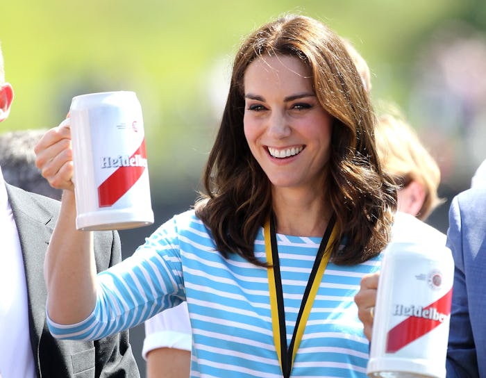 BERLIN, GERMANY - JULY 19:  Catherine, Duchess of Cambridge celebrates with a beer after participati...