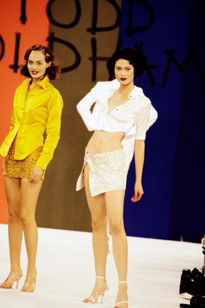 Models Amber Valletta and Shalom Harlow on the runway of the Todd Oldham Spring/Summer 1995 show.