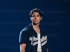 DETROIT, MICHIGAN - AUGUST 24: Joe Jonas performs onstage during Jonas Brothers “Five Albums, One Ni...