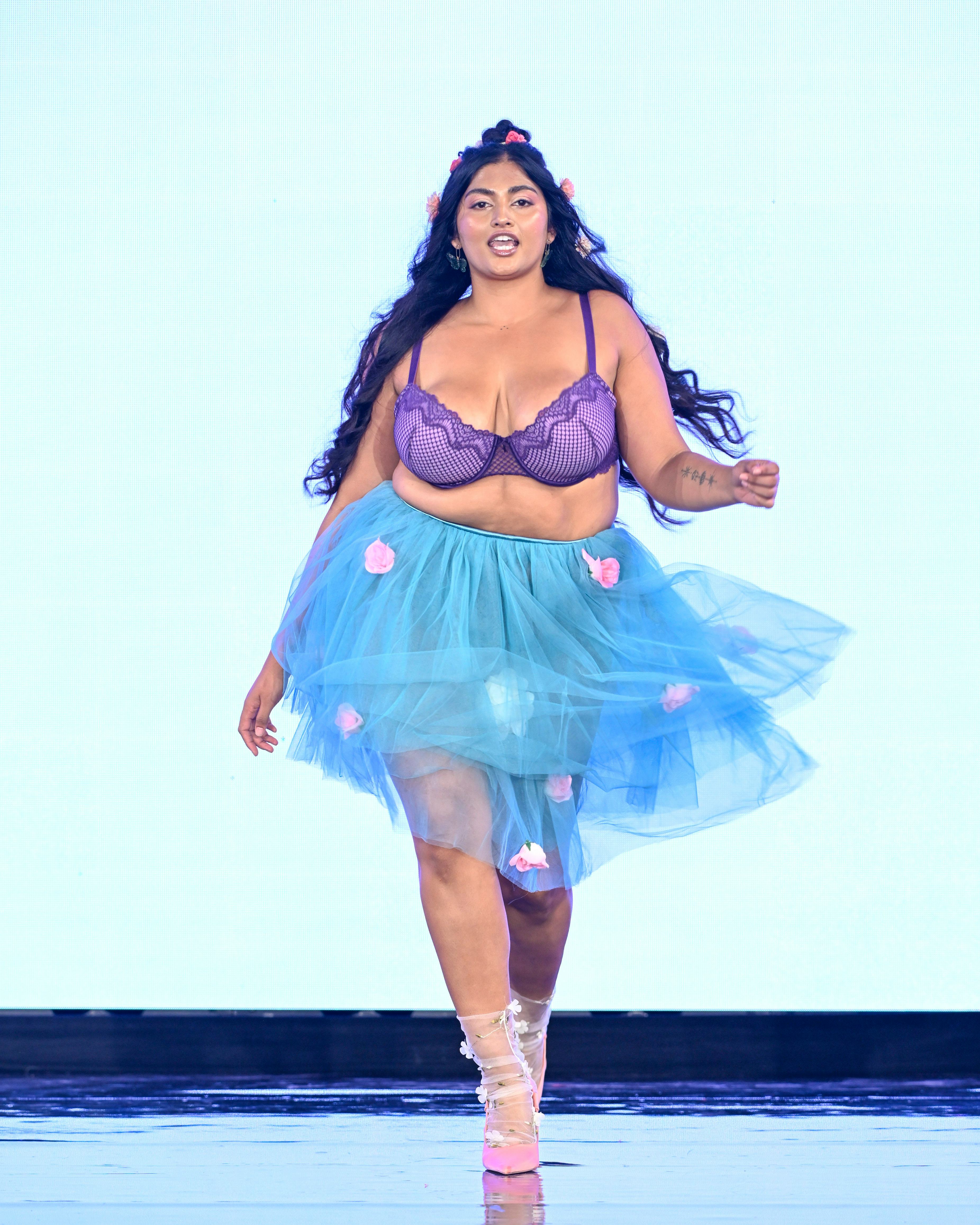 Shreya Navile walks the runway wearing Adore Me during New York Fashion Week.