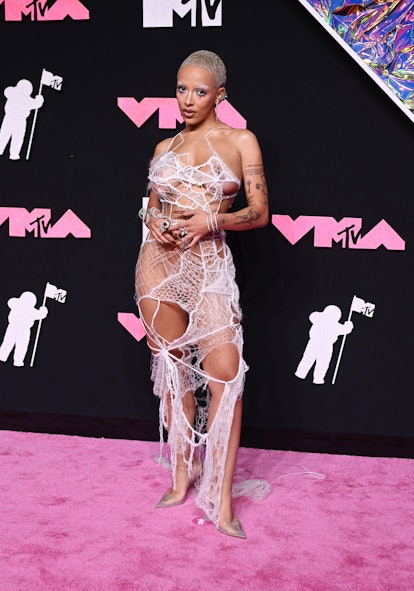 Doja Cat frees the nipple and wears a thong at the 2023 MTV Video Music Awards. 
