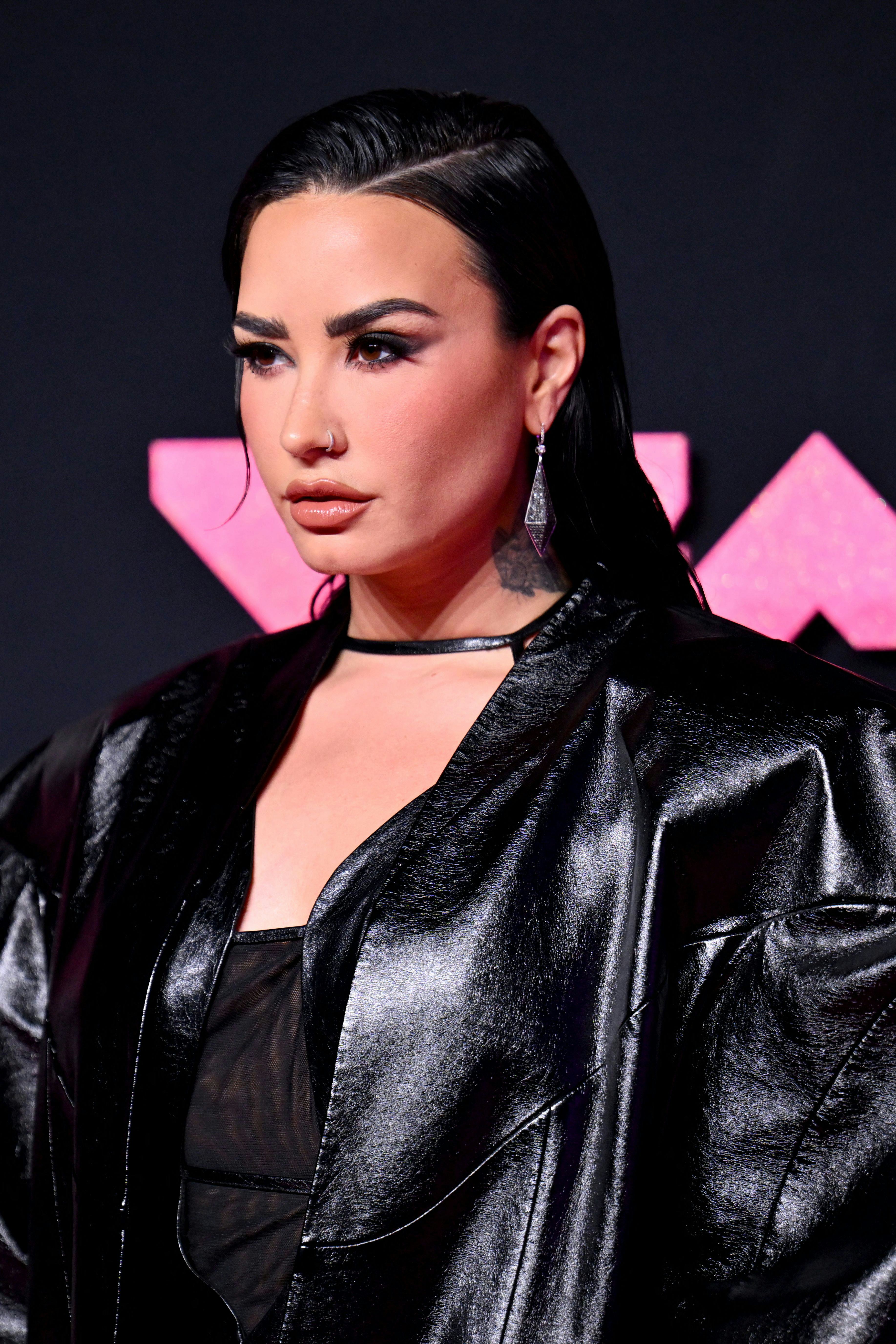 Demi Lovato arrives for the MTV Video Music Awards.