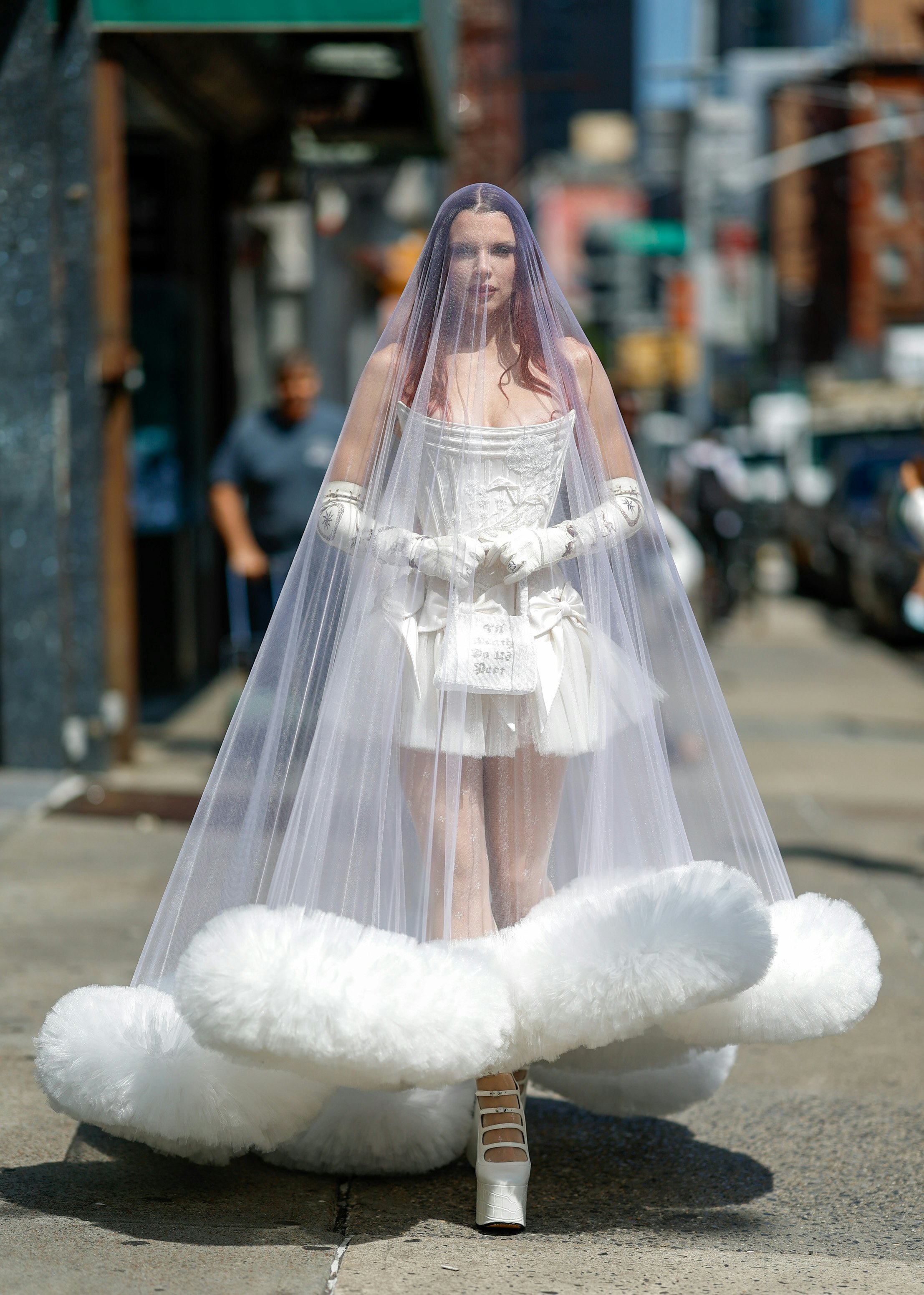 Julia Fox wears just a black thong, wedding veil and train to swanky  Sotheby's event in New York