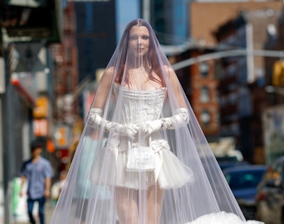Julia Fox wears a wedding gown, veil, and gloves to Wiederhoeft's NYFW show.