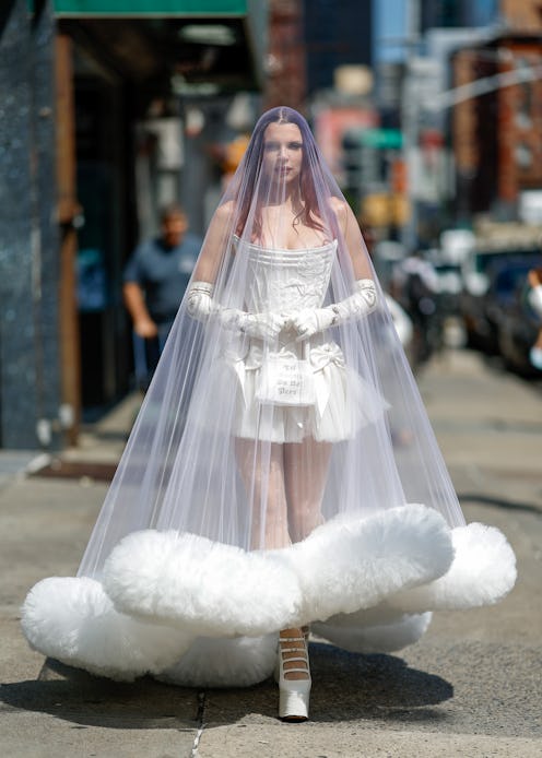 Julia Fox wears a wedding gown, veil, and gloves to Wiederhoeft's NYFW show.
