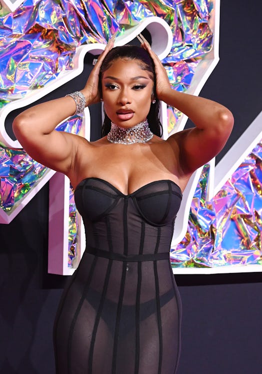 Megan Thee Stallion wears a sheer bustier dress and exposes her thong at the 2023 MTV Video Music Aw…