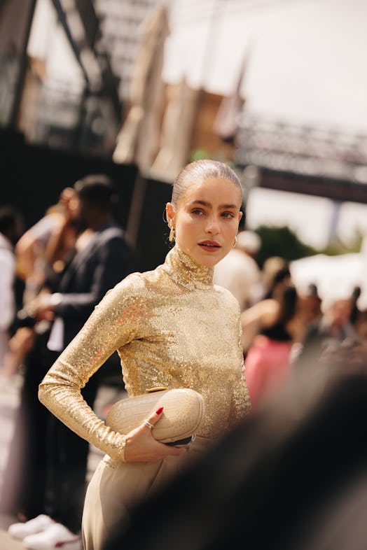 Super-slicked back hairstyles are a New York Fashion Week Spring/Summer 2024 street style beauty tre...