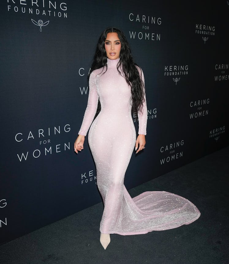 Kim Kardashian arrives on the carpet for the Kering Caring for Women Dinner on September 12, 2023 in...
