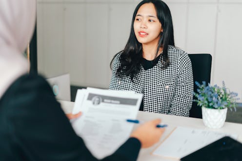 portrait of happy business woman in job interview at the office