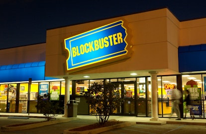 Customers walk into a Blockbuster Video store on November 19, 2002 in the Little Havana section of M...