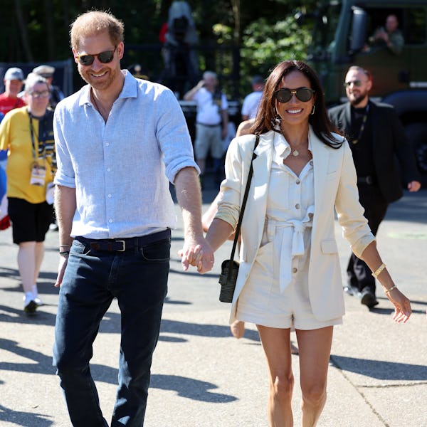 Prince Harry, Duke of Sussex and Meghan, Duchess of Sussex attend the cycling medal ceremony at the ...